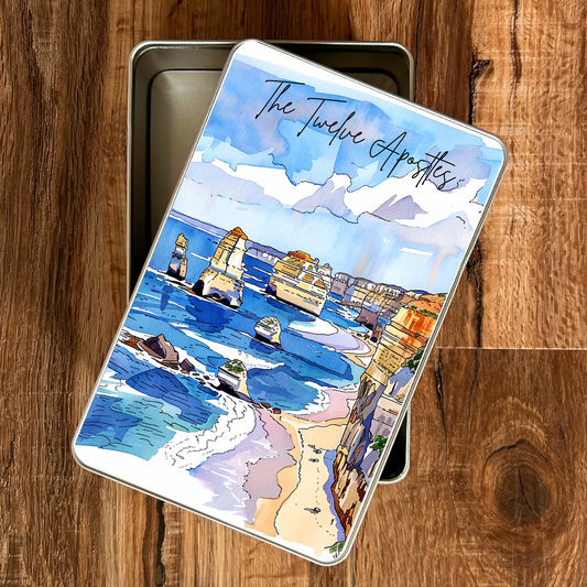 Piccola Gift Tin 'The Twelve Apostles' design on a wooden surface