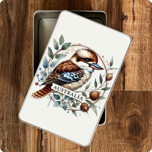 Metallic pouch with a kookaburra illustration on a wooden surface