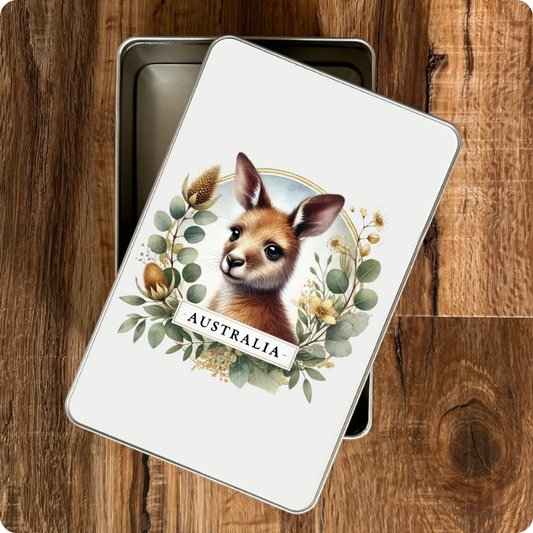 Metallic tin with a kangaroo illustration and 'Australia' text on a wooden surface