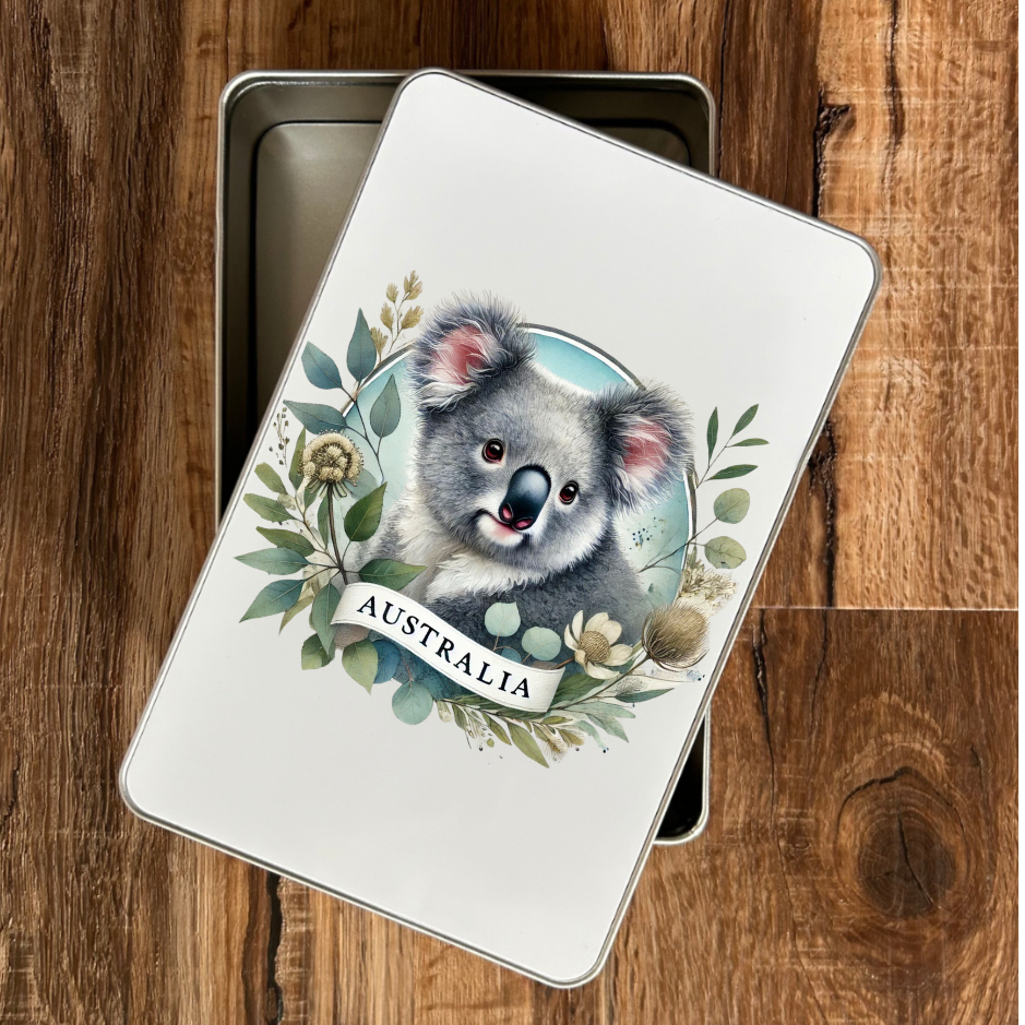 “Australian gift tin with koala artwork filled with honey & eucalyptus lollies – Piccola”